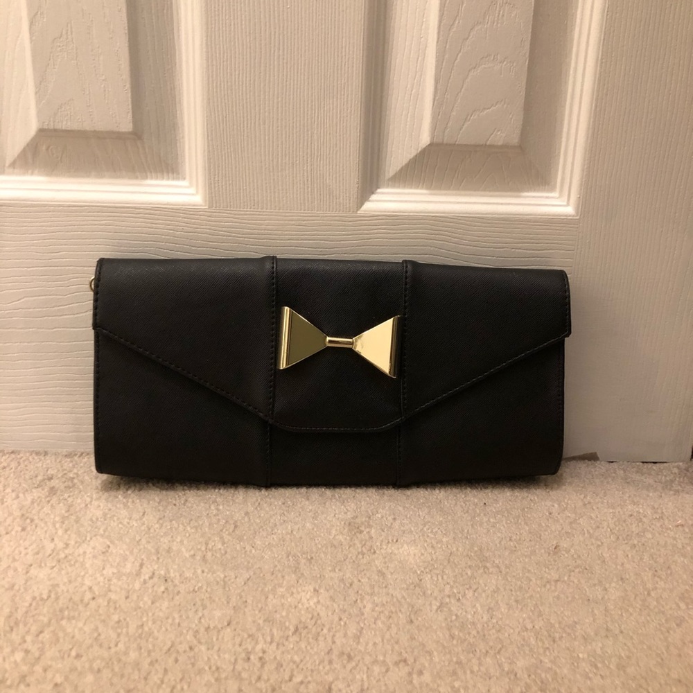 Charming Charlie black & gold clutch